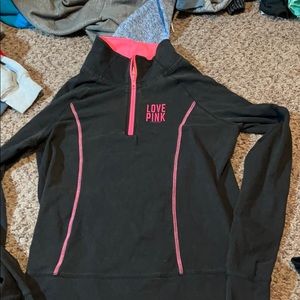 Woman’s pink pullover